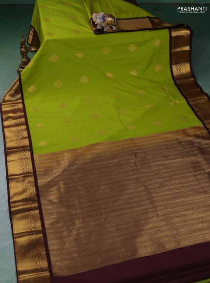 Semi kanchipuram silk saree light green and coffee brown with zari woven buttas and zari woven border