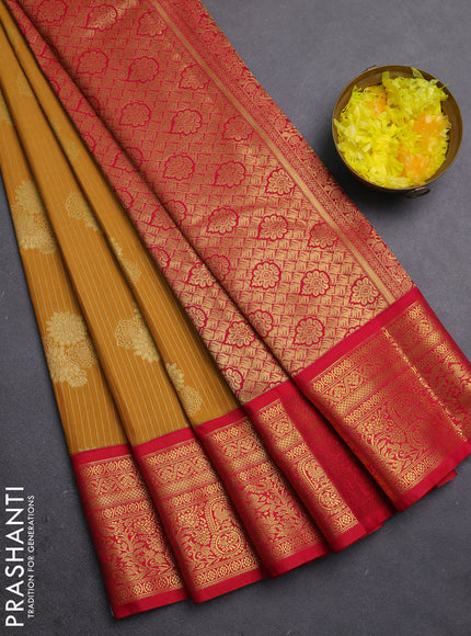 Semi kanchipuram silk saree mustard yellow and pink with allover zari weaves & buttas and zari woven border