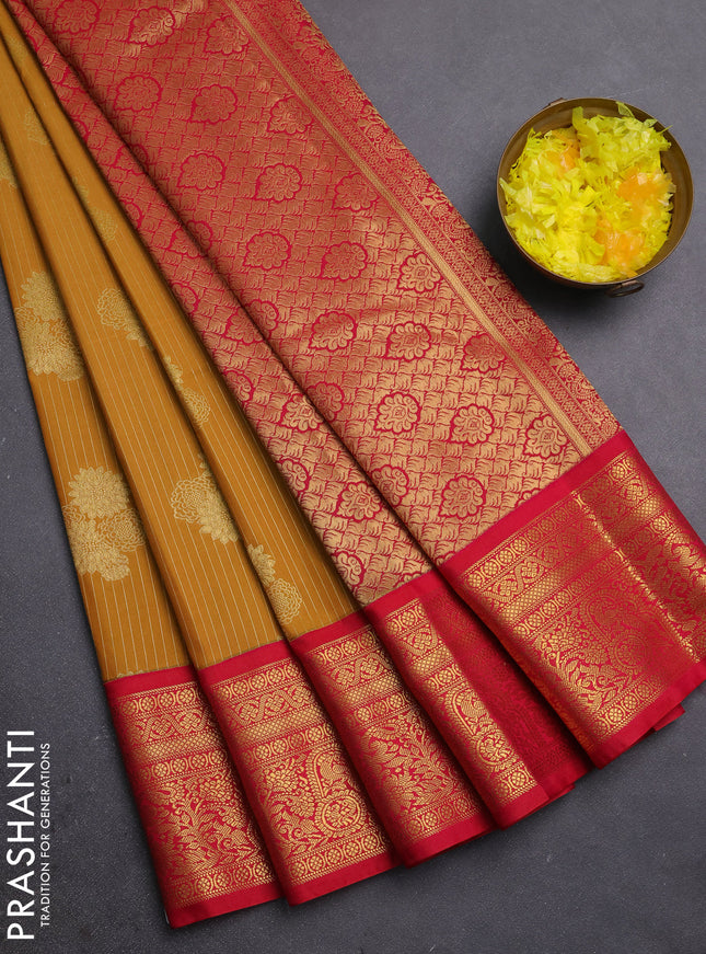 Semi kanchipuram silk saree mustard yellow and pink with allover zari weaves & buttas and zari woven border
