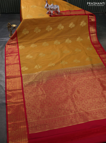 Semi kanchipuram silk saree mustard yellow and pink with allover zari weaves & buttas and zari woven border