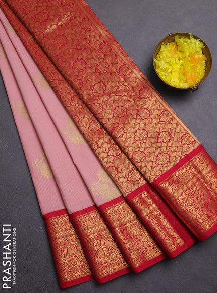 Semi kanchipuram silk saree pastel pink and pink with allover zari weaves & buttas and zari woven border