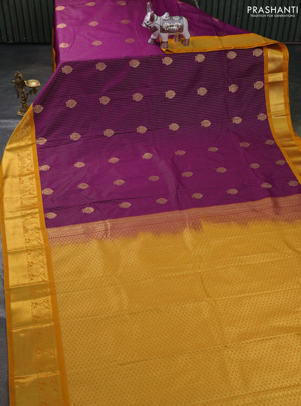 Semi kanchipuram silk saree purple and mustard yellow with allover zari weaves & buttas and zari woven border