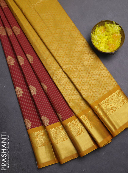Semi kanchipuram silk saree rust shade and mustard yellow with allover zari weaves & buttas and zari woven border