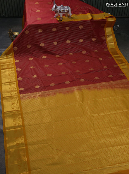 Semi kanchipuram silk saree rust shade and mustard yellow with allover zari weaves & buttas and zari woven border