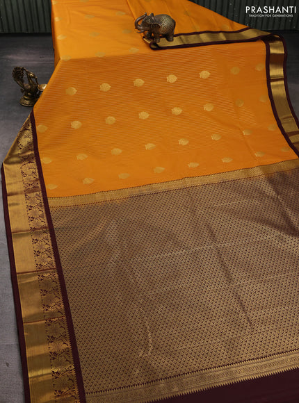 Semi kanchipuram silk saree mustard yellow and deep maroon with allover zari weaves & buttas and zari woven border