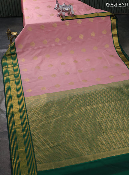 Semi kanchipuram silk saree pastel pink and bottle green with zari woven buttas and zari woven border