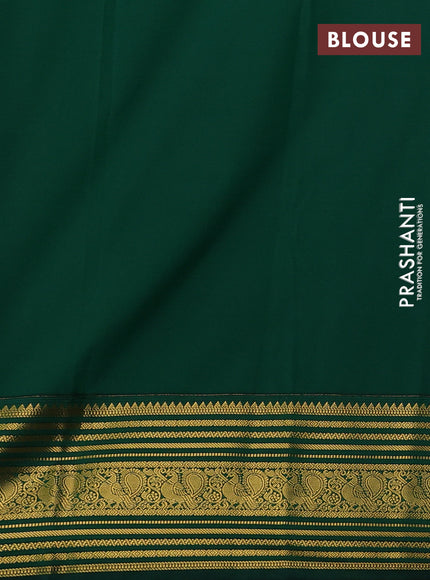 Semi kanchipuram silk saree pastel pink and bottle green with zari woven buttas and zari woven border