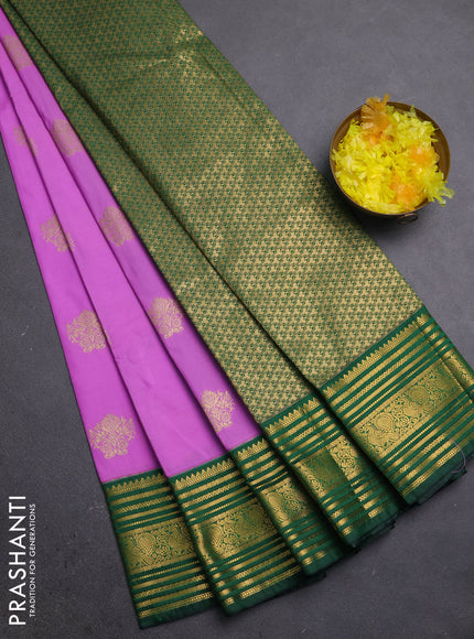 Semi kanchipuram silk saree lotus pink and bottle green with zari woven buttas and zari woven border