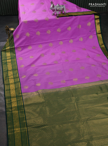Semi kanchipuram silk saree lotus pink and bottle green with zari woven buttas and zari woven border