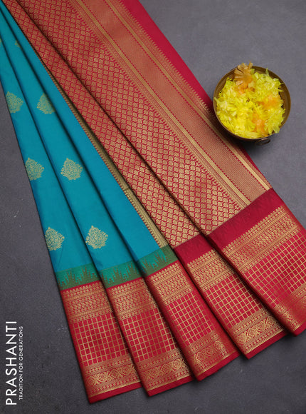 Semi kanchipuram silk saree dual shade of teal green and maroon with zari woven buttas and temple design zari woven border