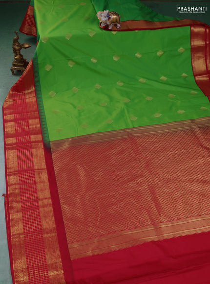 Semi kanchipuram silk saree light green and maroon with zari woven buttas and temple design zari woven border