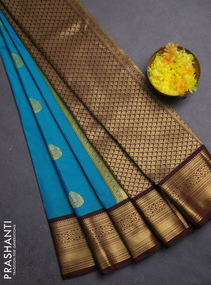 Semi kanchipuram silk saree teal green and coffee brown with zari woven buttas and zari woven border