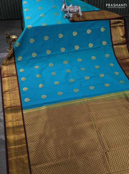 Semi kanchipuram silk saree teal green and coffee brown with zari woven buttas and zari woven border
