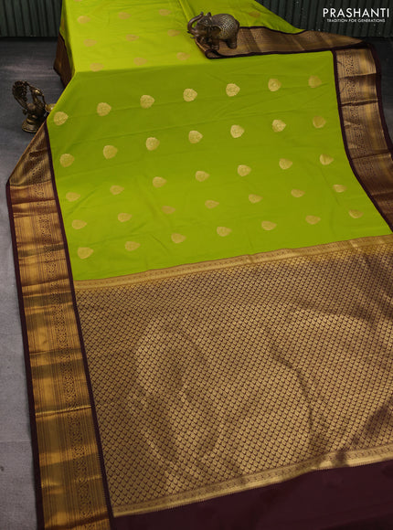Semi kanchipuram silk saree lime green and coffee brown with zari woven buttas and zari woven korvai border
