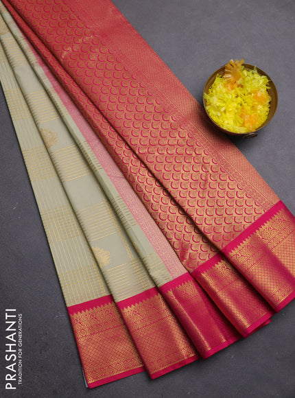 Semi kanchipuram silk saree pista green and pink with allover zari checks & buttas and zari woven korvai border
