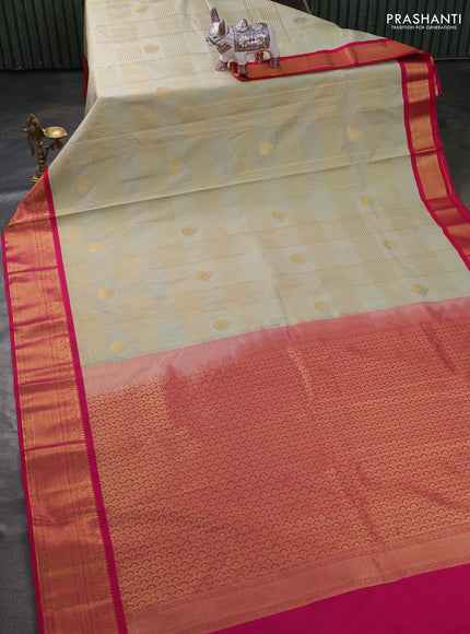 Semi kanchipuram silk saree pista green and pink with allover zari checks & buttas and zari woven korvai border