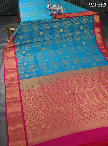 Semi kanchipuram silk saree teal blue and pink with allover zari checks & buttas and zari woven korvai border