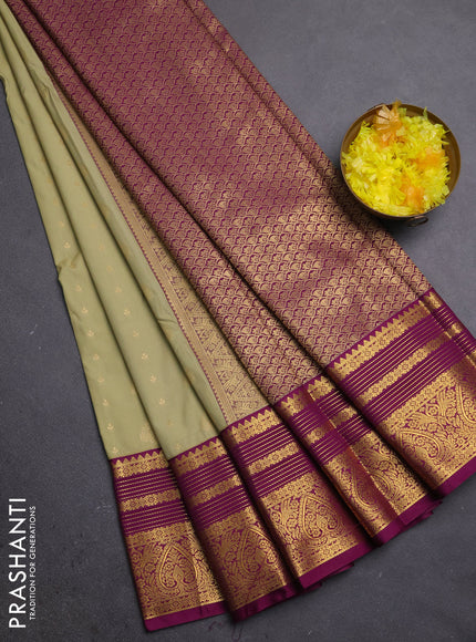 Semi kanchipuram silk saree pista green and magenta pink with allover zari woven buttas and long zari woven border