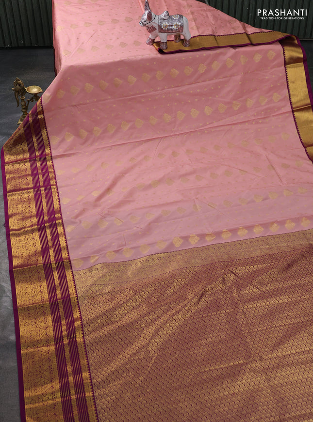 Semi kanchipuram silk saree pastel pink and magenta pink with allover zari woven buttas and long zari woven border