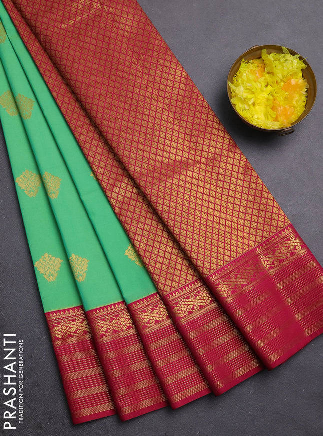 Semi kanchipuram silk saree teal green and magenta pink with zari woven buttas and zari woven border