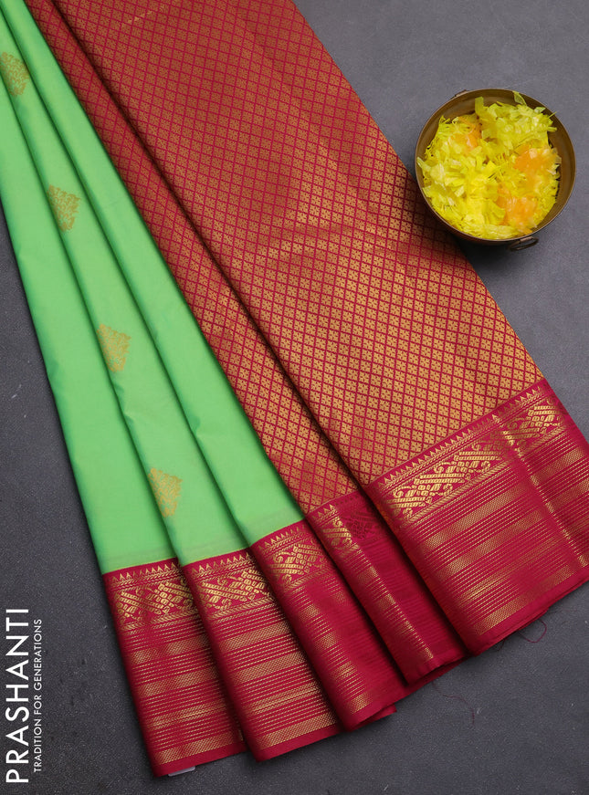 Semi kanchipuram silk saree fluorescent green and magenta pink with zari woven buttas and zari woven border