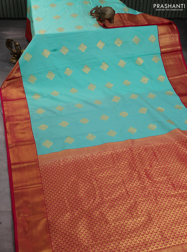 Semi kanchipuram silk saree teal green and pink with zari woven buttas and zari woven border