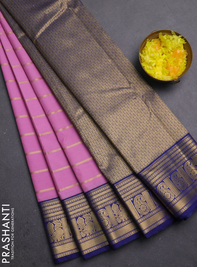 Semi kanchipuram silk saree lotus pink and navy blue with allover zari stripe pattern and zari woven border