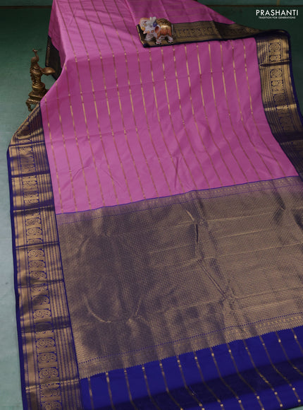 Semi kanchipuram silk saree lotus pink and navy blue with allover zari stripe pattern and zari woven border