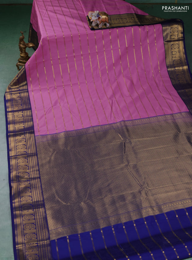 Semi kanchipuram silk saree lotus pink and navy blue with allover zari stripe pattern and zari woven border
