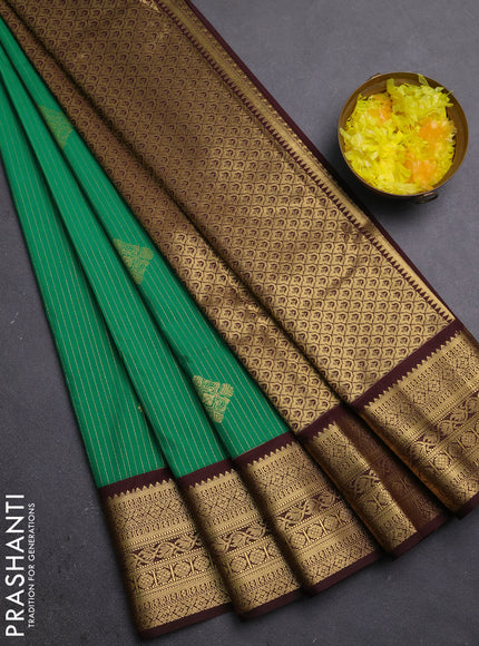 Semi kanchipuram silk saree green and coffee brown with allover zari weaves & buttas and zari woven border