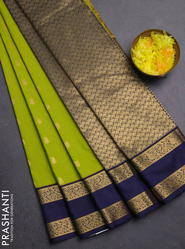 Semi kanchipuram silk saree lime green and navy blue with allover zari woven buttas and rettapet zari woven border
