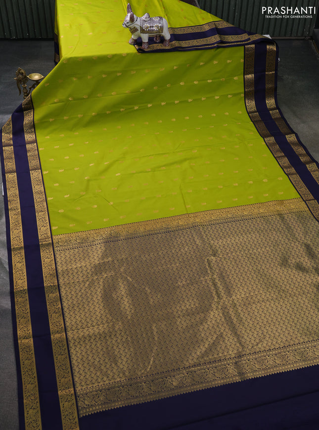 Semi kanchipuram silk saree lime green and navy blue with allover zari woven buttas and rettapet zari woven border