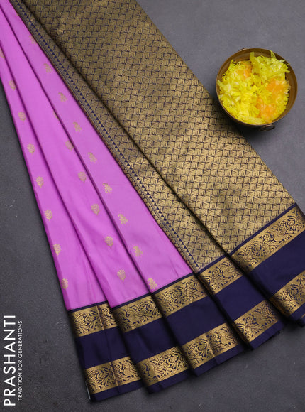 Semi kanchipuram silk saree lotus pink and navy blue with allover zari woven buttas and rettapet zari woven border