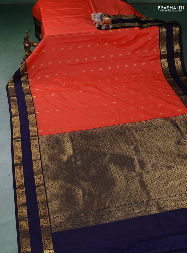 Semi kanchipuram silk saree orange and navy blue with allover zari woven buttas and rettapet zari woven border