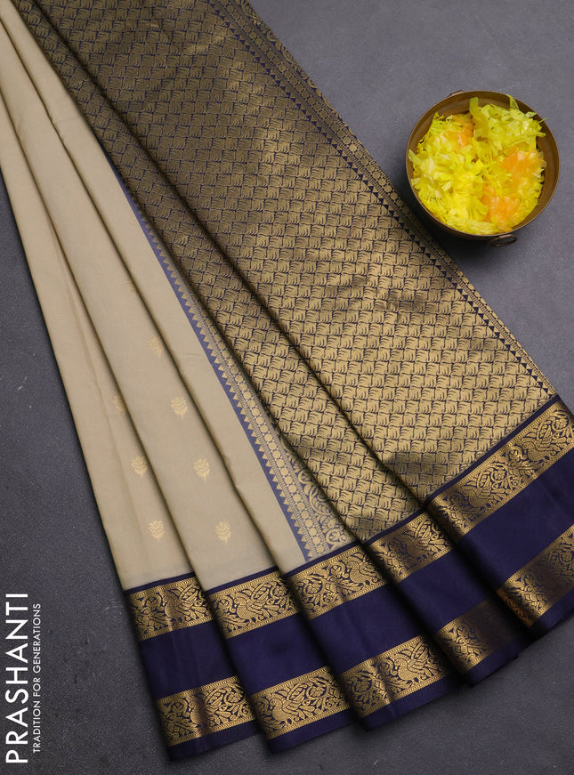 Semi kanchipuram silk saree beige and navy blue with allover zari woven buttas and rettapet zari woven border