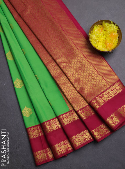 Semi kanchipuram silk saree light green and magenta pink with zari woven buttas and rettapet zari woven border