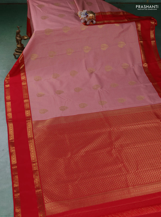 Semi kanchipuram silk saree peach shade and red with allover zari checks & buttas and rettapet zari woven border