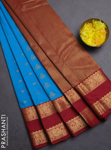 Semi kanchipuram silk saree cs blue and maroon with allover zari woven buttas and rettapet zari woven border