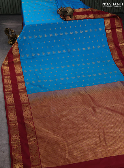 Semi kanchipuram silk saree cs blue and maroon with allover zari woven buttas and rettapet zari woven border