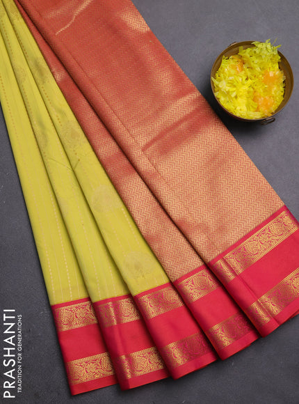 Semi kanchipuram silk saree pale yellow and pinkish orange with allover zari weaves & buttas and rettapet zari woven border