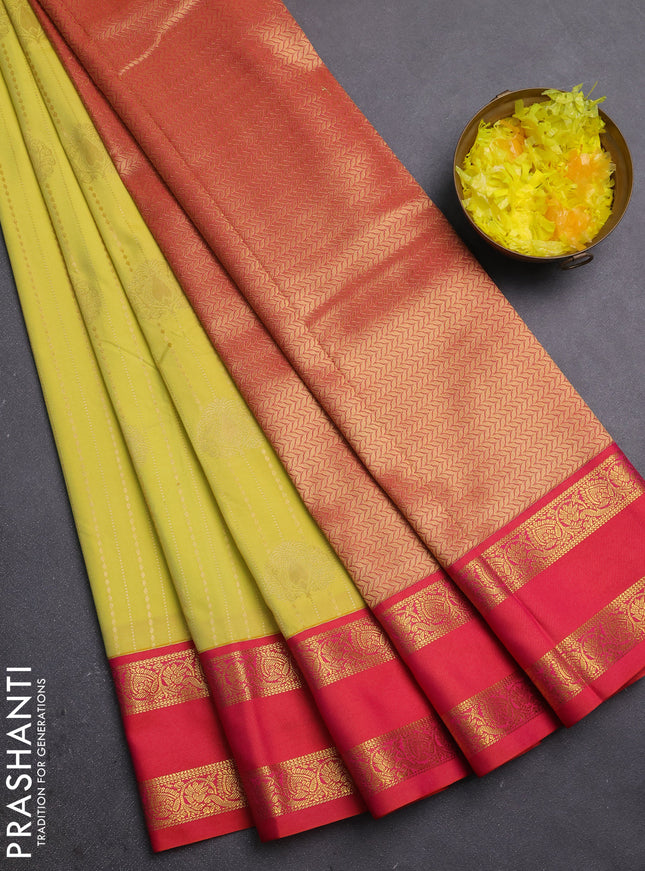 Semi kanchipuram silk saree pale yellow and pinkish orange with allover zari weaves & buttas and rettapet zari woven border