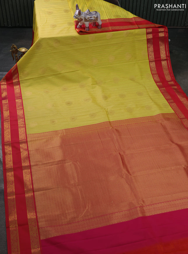 Semi kanchipuram silk saree pale yellow and pinkish orange with allover zari weaves & buttas and rettapet zari woven border