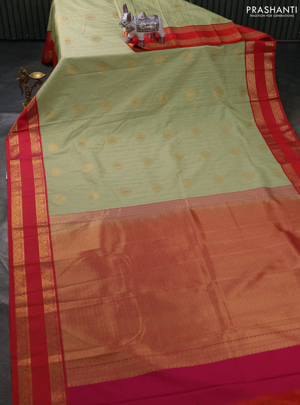 Semi kanchipuram silk saree pista green and orange with allover zari weaves & buttas and rettapet zari woven border