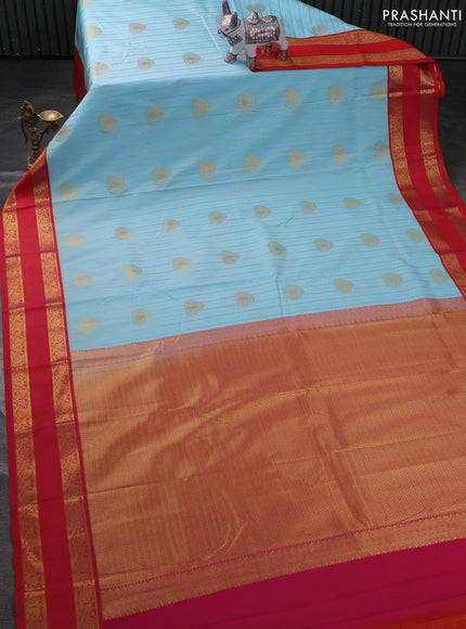 Semi kanchipuram silk saree teal blue and orange with allover zari weaves & buttas and rettapet zari woven border