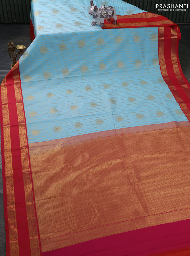 Semi kanchipuram silk saree teal blue and orange with allover zari weaves & buttas and rettapet zari woven border