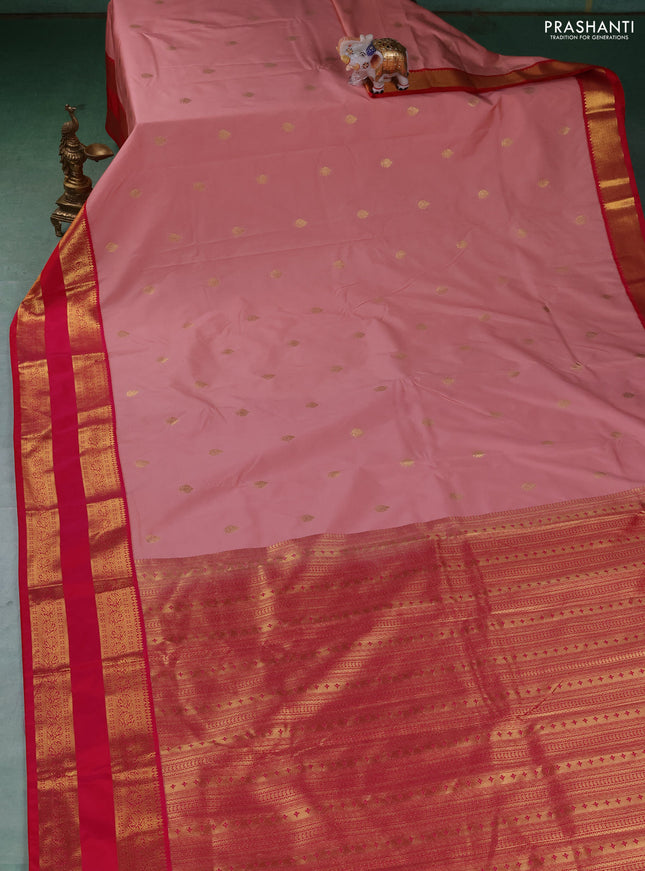 Semi kanchipuram silk saree peach shade and pink with zari woven buttas and rettapet zari woven border