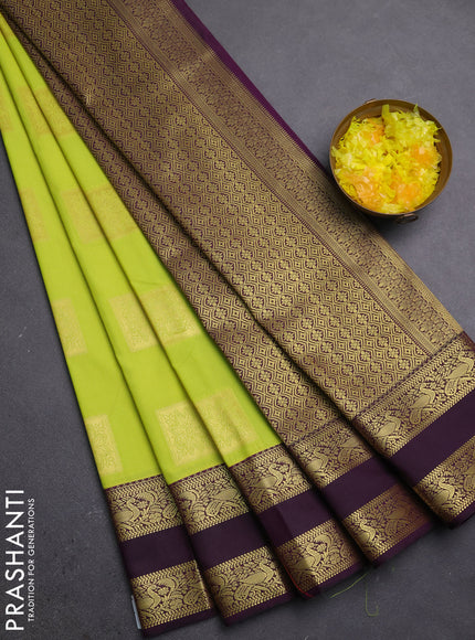 Semi kanchipuram silk saree lime green and purple with zari woven buttas and rettapet zari woven border