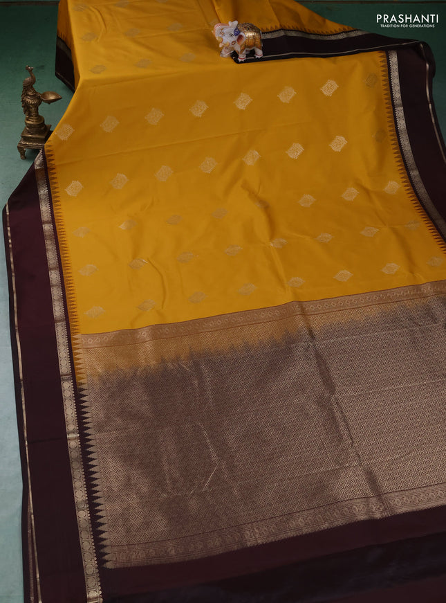 Semi kanchipuram silk saree mustard yellow and deep maroon with zari woven buttas and temple design rettapet zari woven border