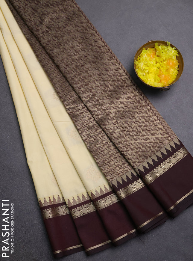 Semi kanchipuram silk saree cream and deep maroon with zari woven buttas and temple design rettapet zari woven border