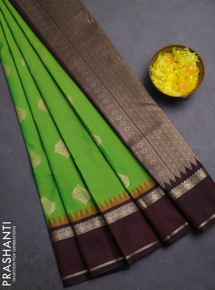 Semi kanchipuram silk saree light green and coffee brown with zari woven buttas and temple design rettapet zari woven border